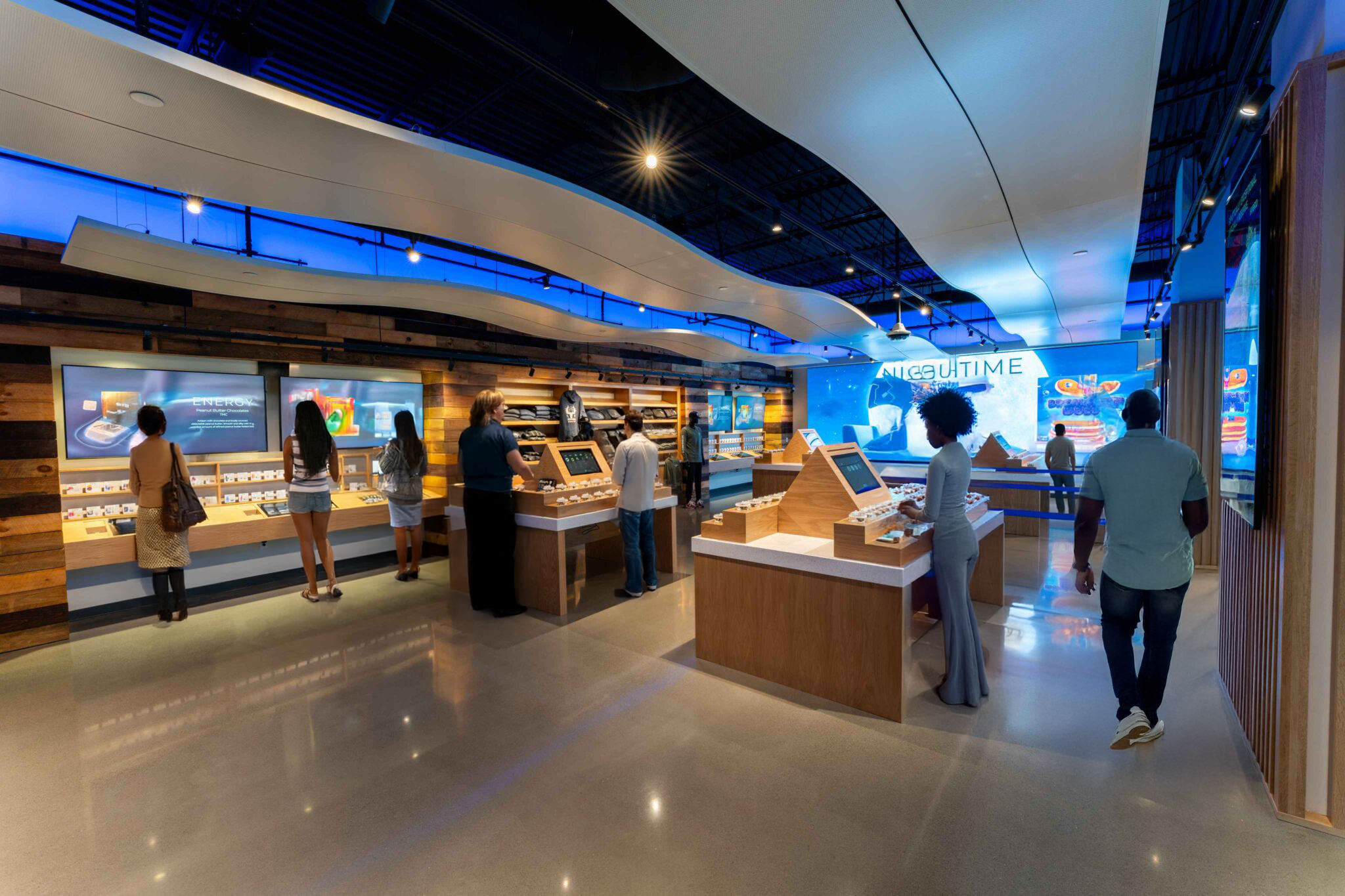 Modern dispensary layout with smart retail stations and menu screens